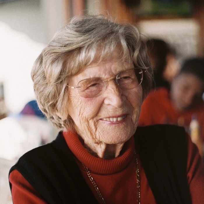 Image of an older woman smiling.