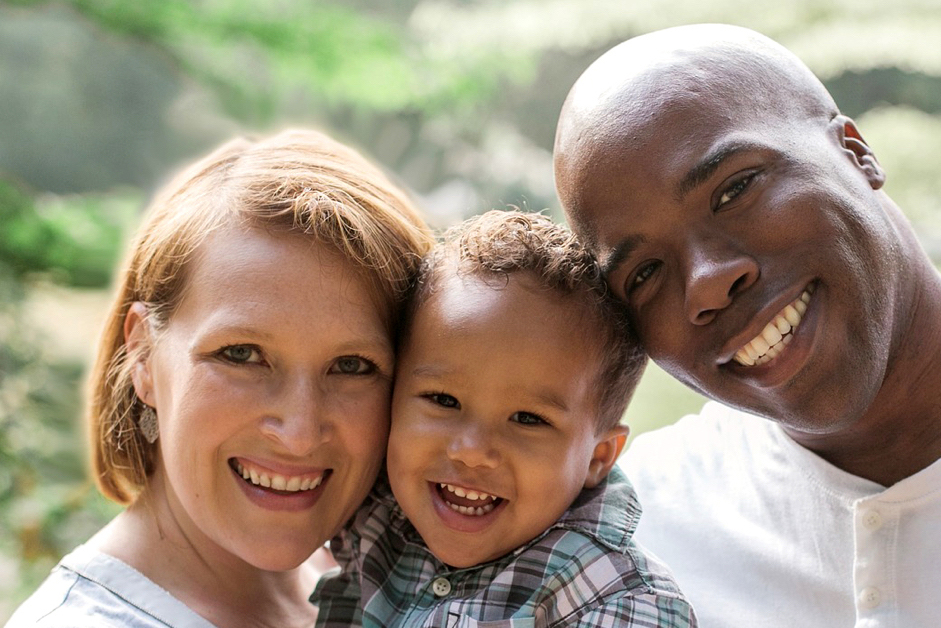 Image of a couple and their young son for Family Services.